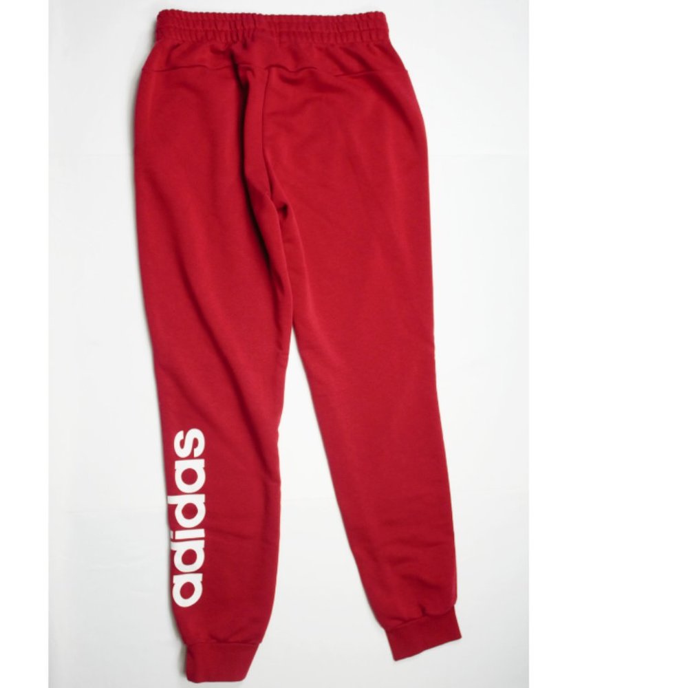 Red Adidas track pants